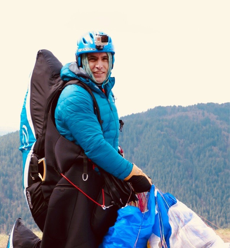 Paragliding over a mountain landscape